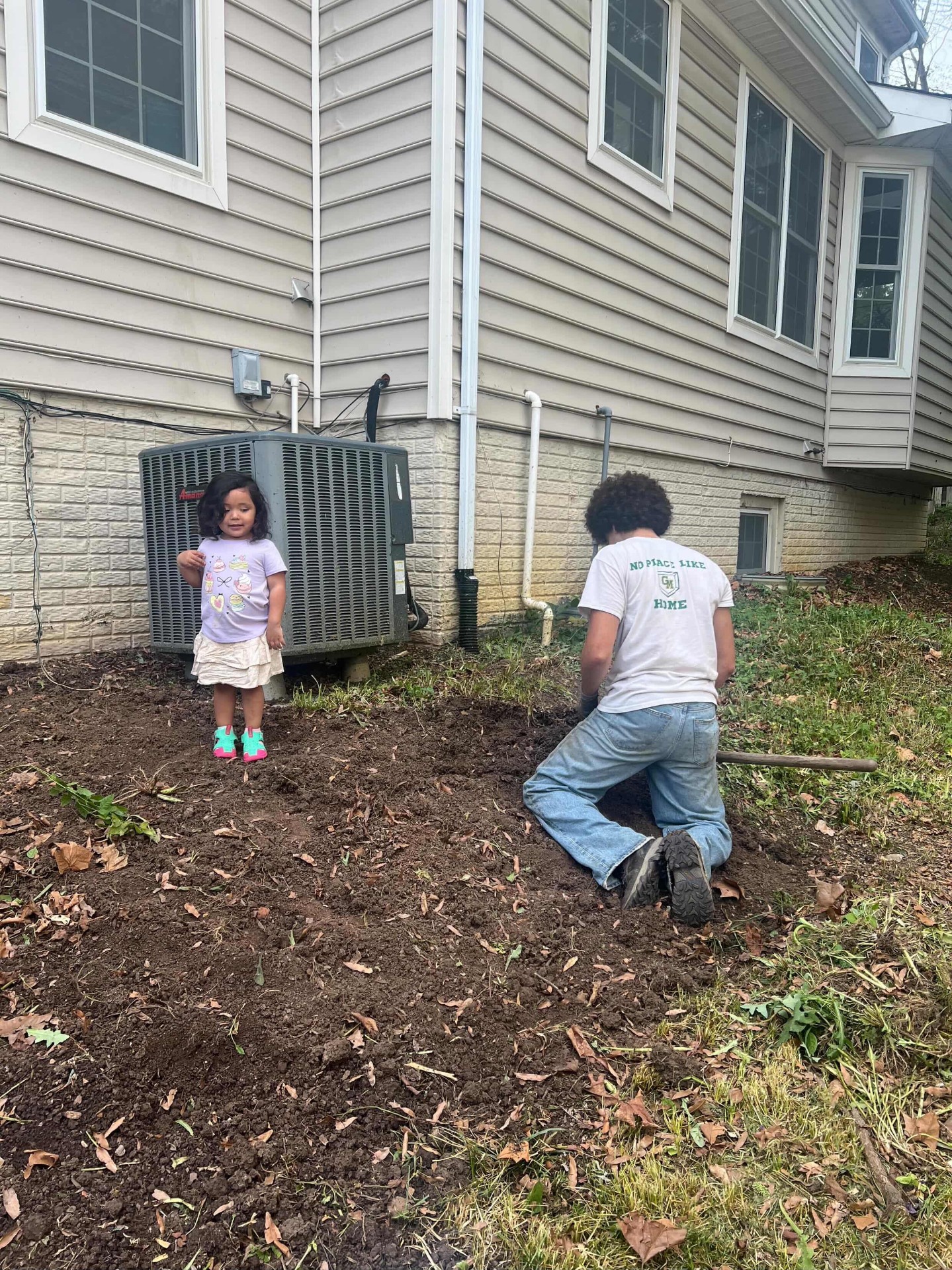 Team prepping soil for a new lawn install